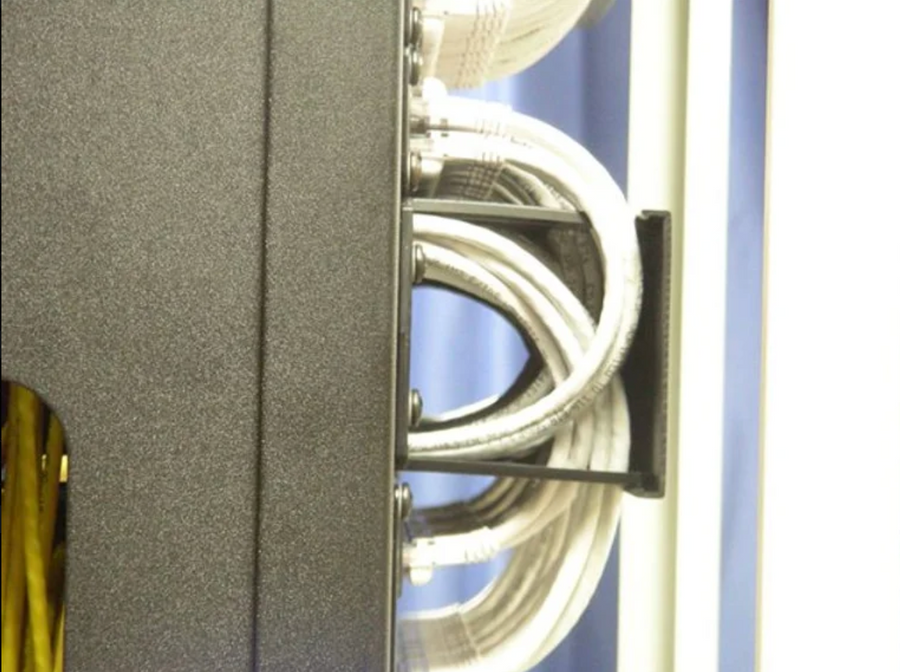 Uniform cable routing demonstrating controlled bend radius and consistent cable management with NEAT-PATCH