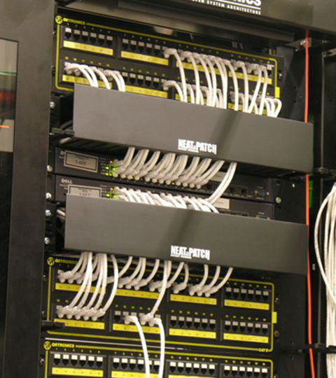 NEAT-PATCH cable management cleanup performed on BICSI network rack installation