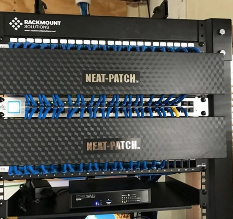NEAT-PATCH cable managers installed in network rack delivering clean, structured patch cord organization